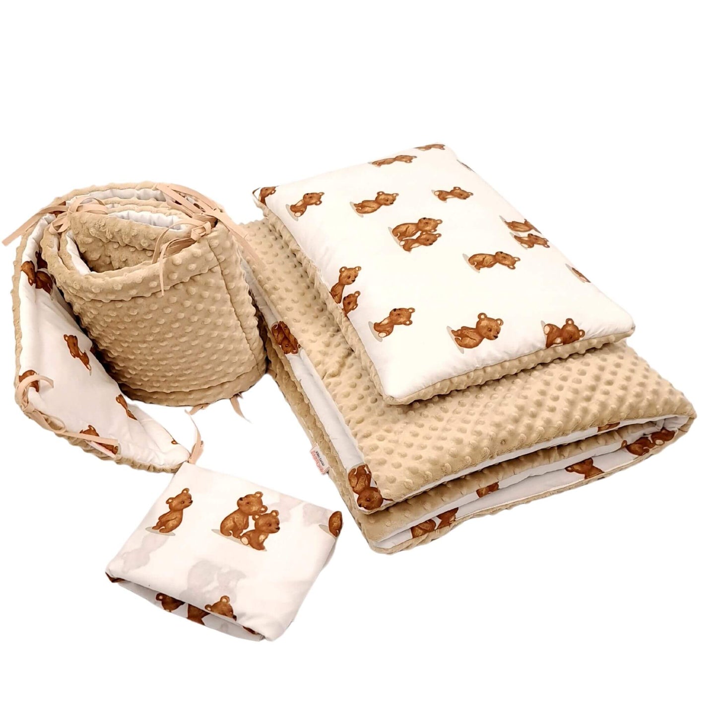 A 4-piece baby bedding set featuring a duvet, pillow, cot bumper & fitted sheet, made from 100% breathable cotton with plush beige minky fabric on the reverse, perfect for a cozy, safe nursery.