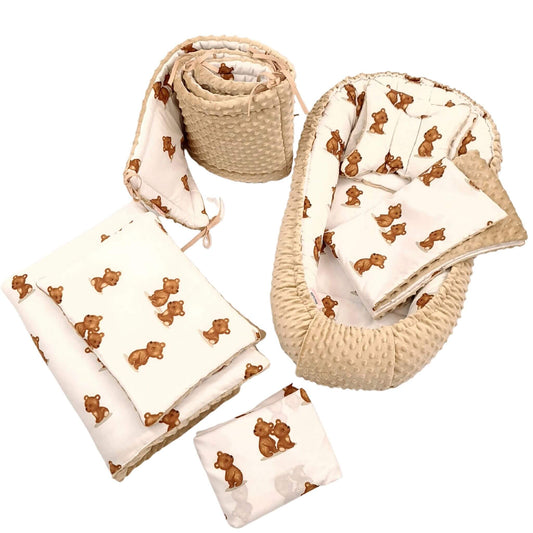 A 9-piece baby bedding set featuring a baby nest, cot bumper, quilt, pillow & fitted sheet, made from 100% breathable cotton with plush beige minky fabric on the reverse, perfect for a cozy, safe nursery.