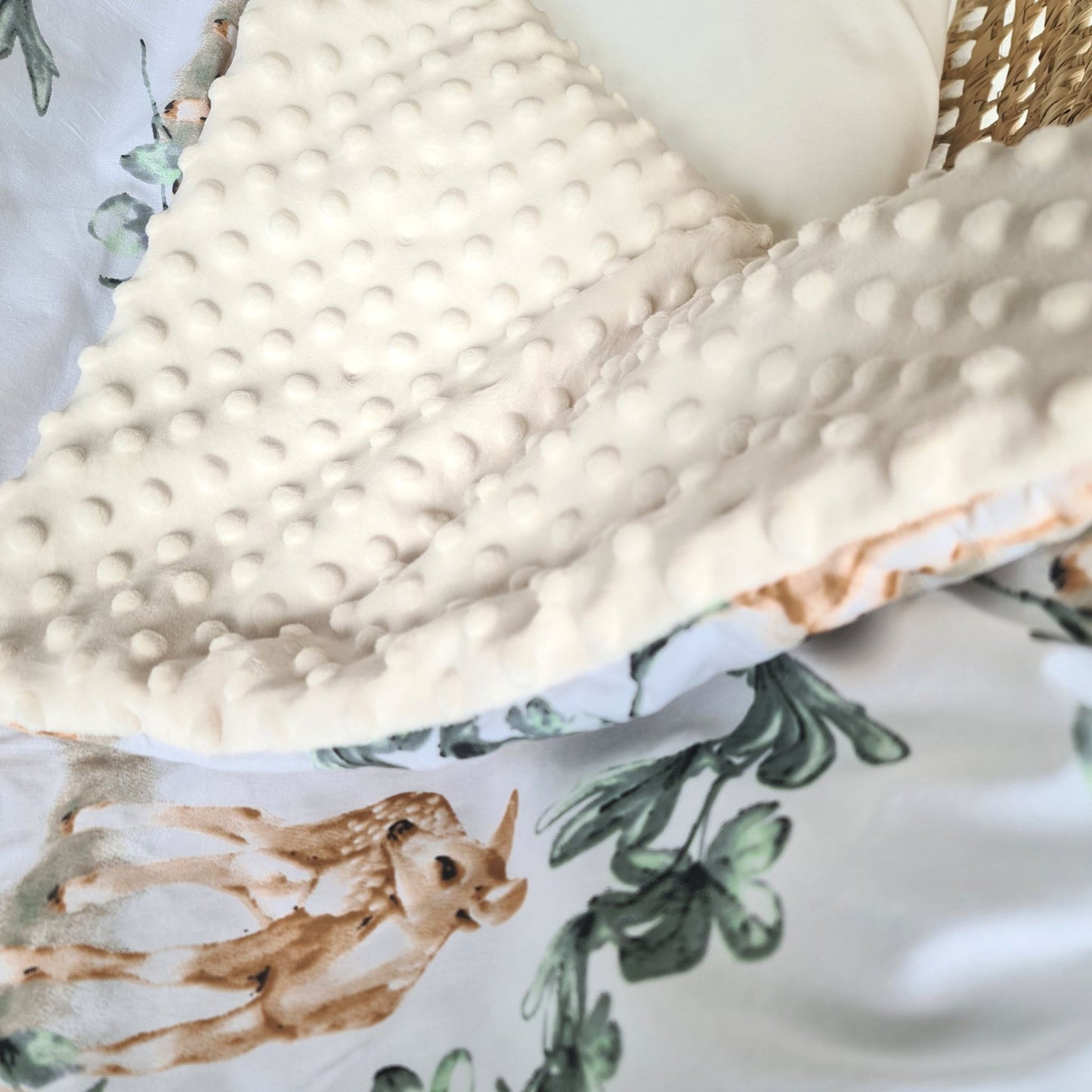 blanket for baby cosy cream plush and cotton with deer and eucaliptus leaves pattern