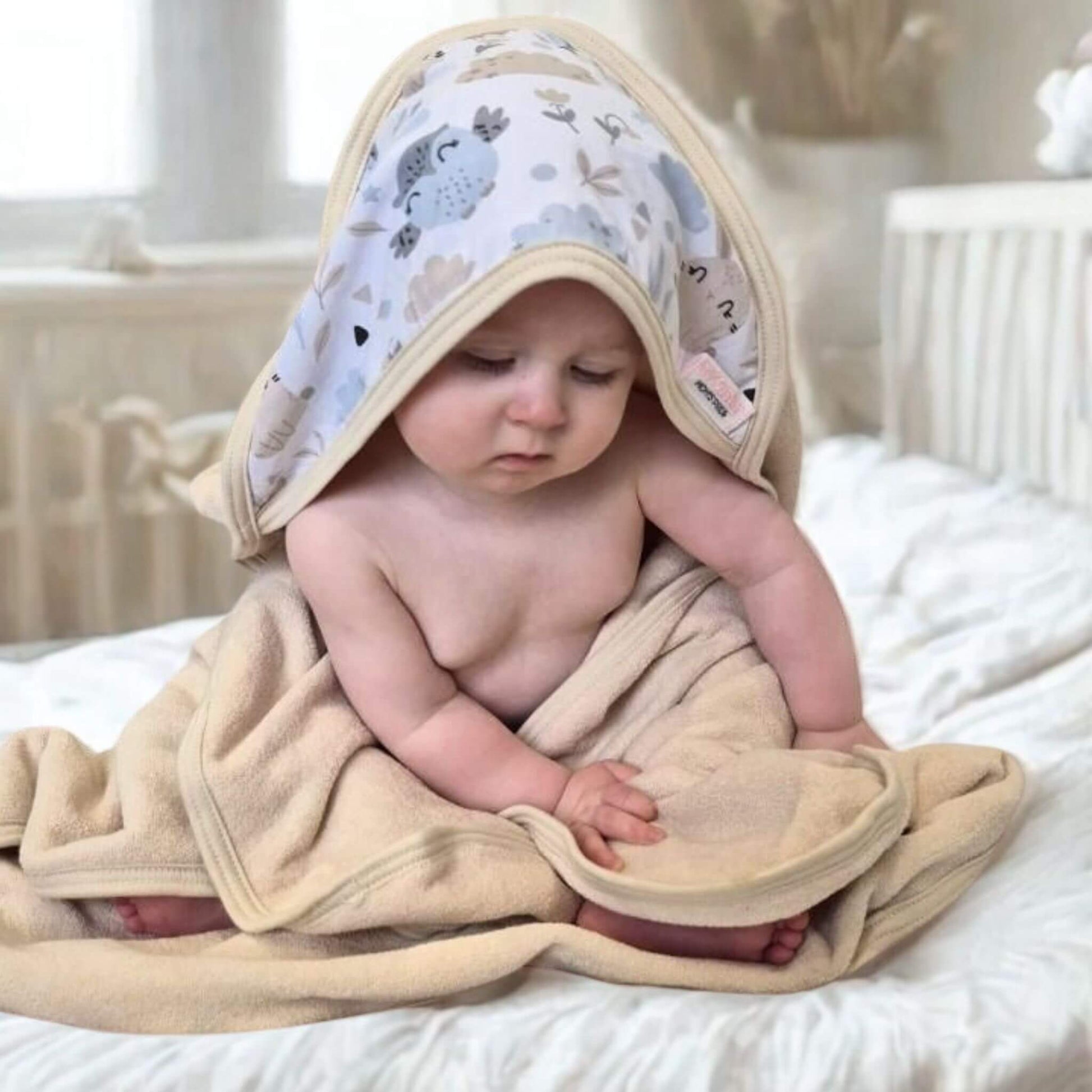 baby wrapped in luxurious bath hooded towel for age 0-5 years big size beige natural colour with owls on the hood