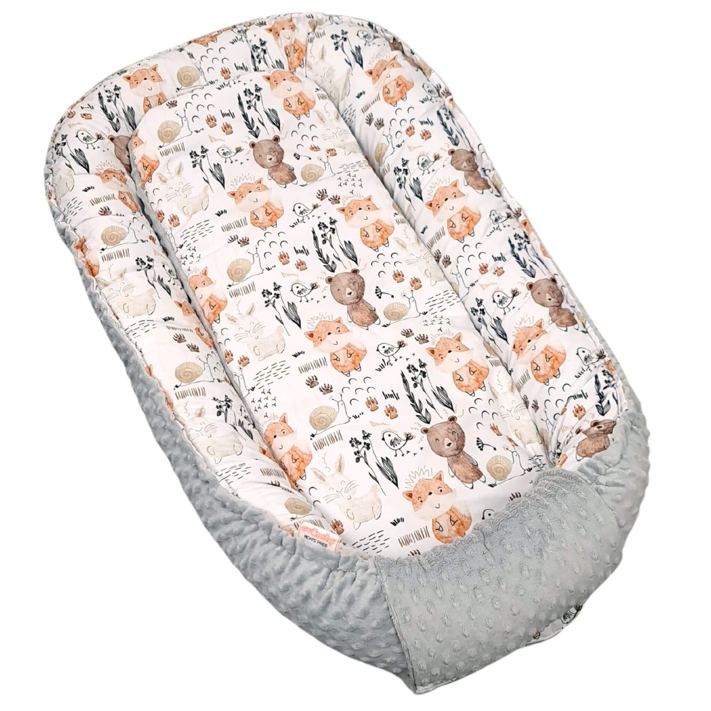 baby nest xxl for a big baby organic cotton soft and breadable with woodland theme with bears foxes bunnies and floral