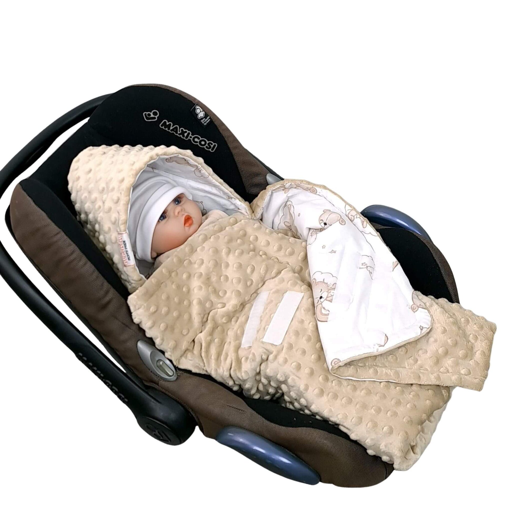 baby wrapped in blanket with hood and velcro fastening for easy closing