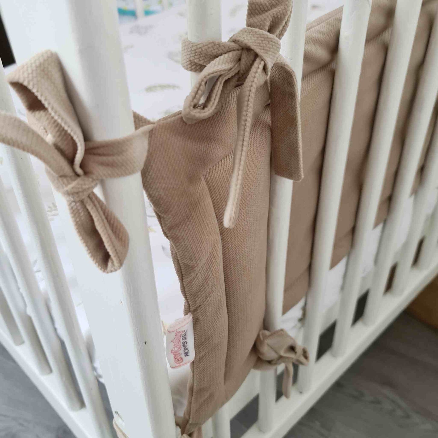 easy to attach cot bed bumper beige colour for long side of the cot comes in 2 sizes 140cm and 120 cm evCushy