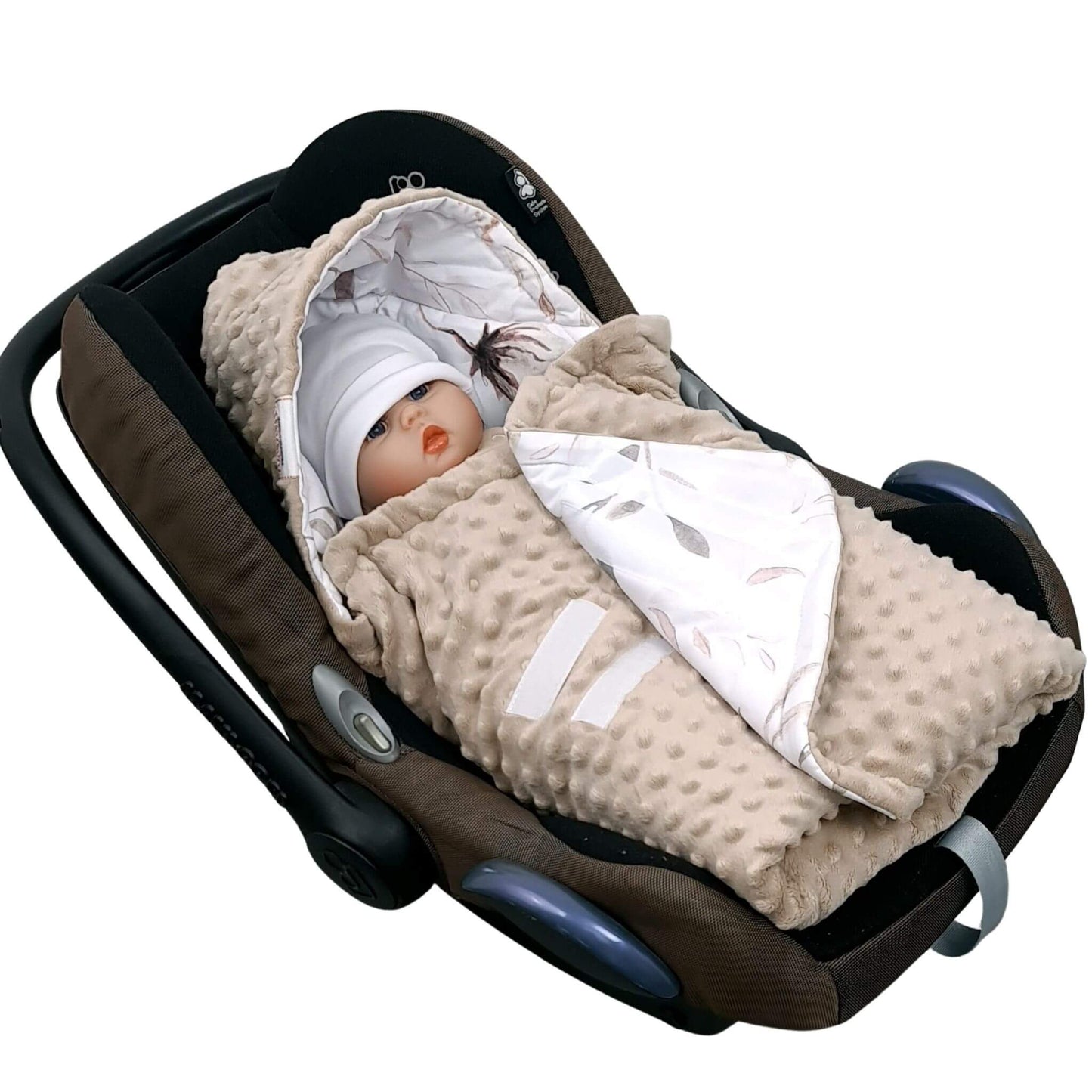 Close-up of Evcushy Cotton Blossom car seat blanket with Velcro fastening for easy baby wrapping