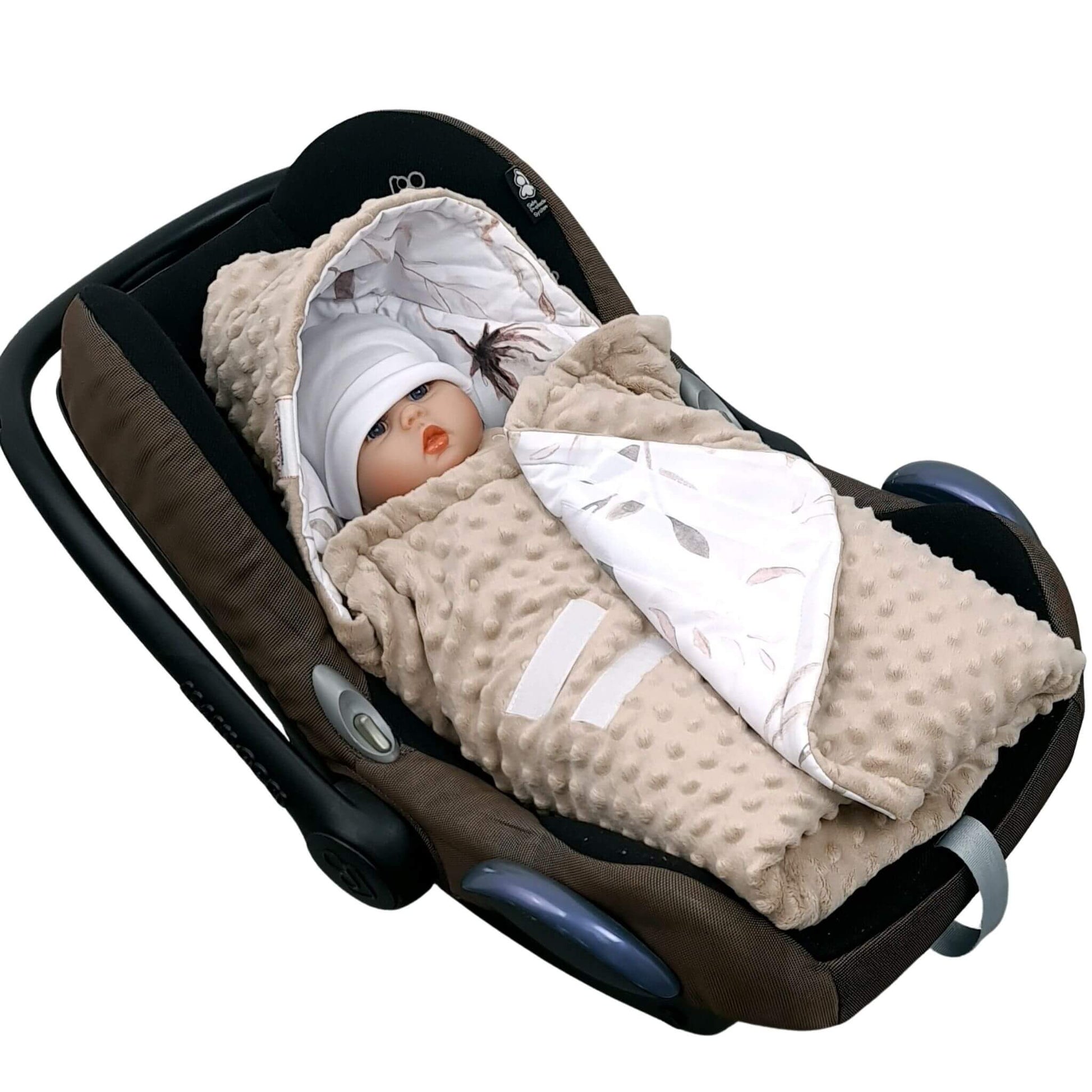 Close-up of Evcushy Cotton Blossom car seat blanket with Velcro fastening for easy baby wrapping