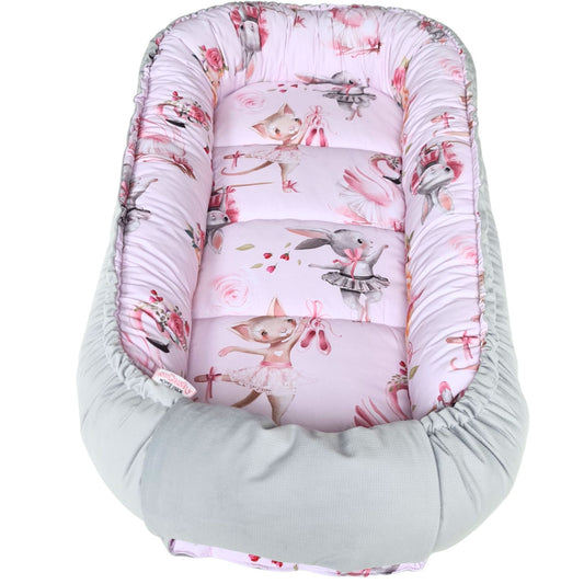 xxl baby sleeping pod nest pink with ballerinas bunnies, kittens and  swans and grey cosy velvet on the reverse side up to 36 months
