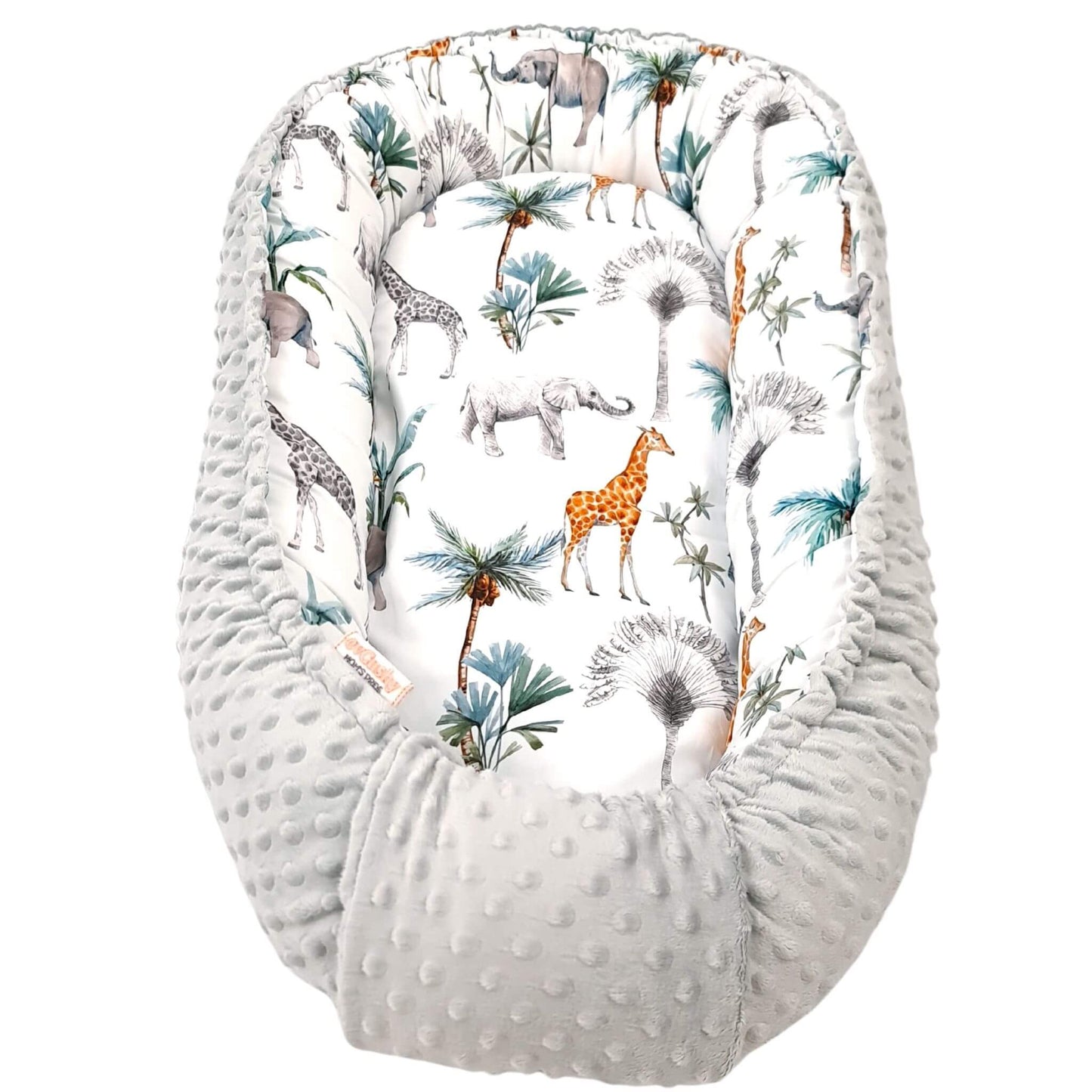 evCushy Baby Nest – Safari Adventure side featuring elephants, giraffes, and rhinos among palm trees