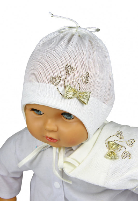 Cream baby girl hat with a bow