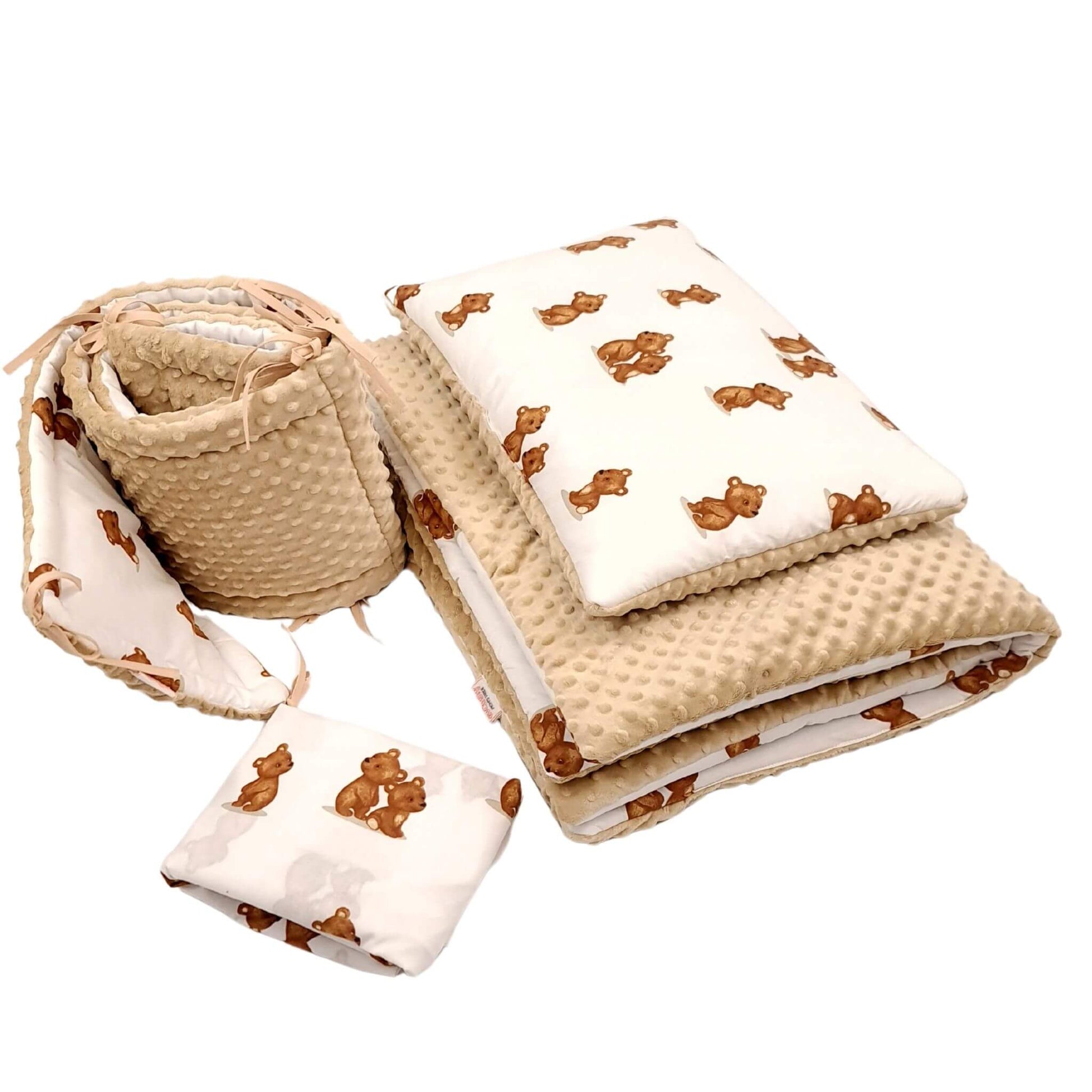  A 4-piece baby bedding set featuring a duvet, pillow, cot bumper & fitted sheet, made from 100% breathable cotton with plush beige minky fabric on the reverse, perfect for a cozy, safe nursery.