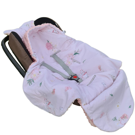 Stay prepared for any adventure with this pink, cosy universal car seat blanket. Specifically designed for infants up to 12 months, it's the perfect wrap to keep your little one snug during travels.