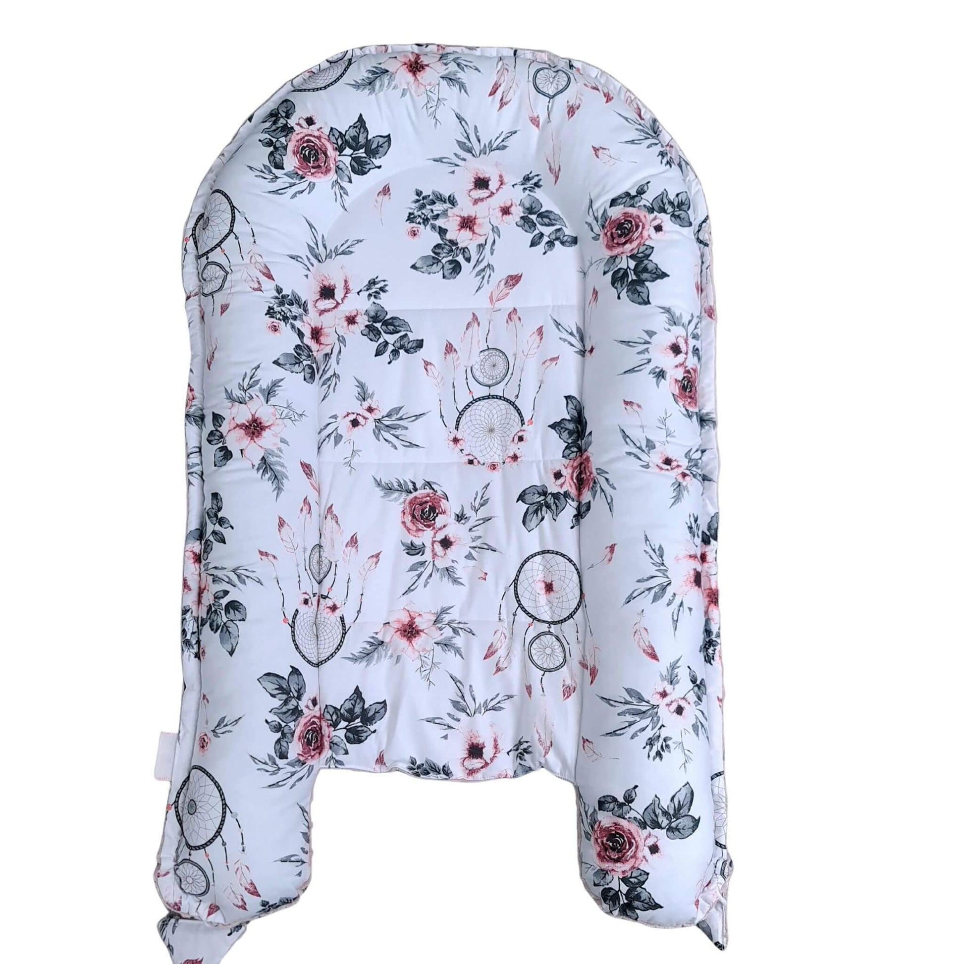 Floral and dreamcatcher patterned baby carrier Premium pink baby lounger by Evcushy – safe and snug baby nest with liner, ideal from birth to 9 months.

