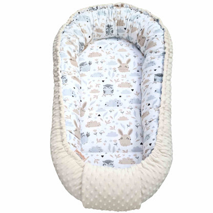 baby nest from newborn owls sleeping pod evcushy cream colour plush soft fabric
