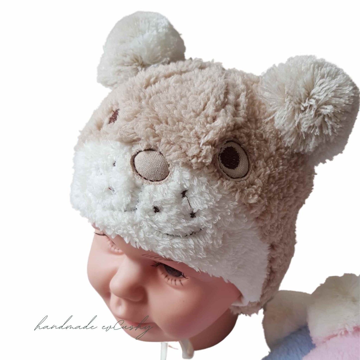 Winking Teddy Bear Winter Baby Hat: Cozy Unisex Style in Blue, Brown, and Pink