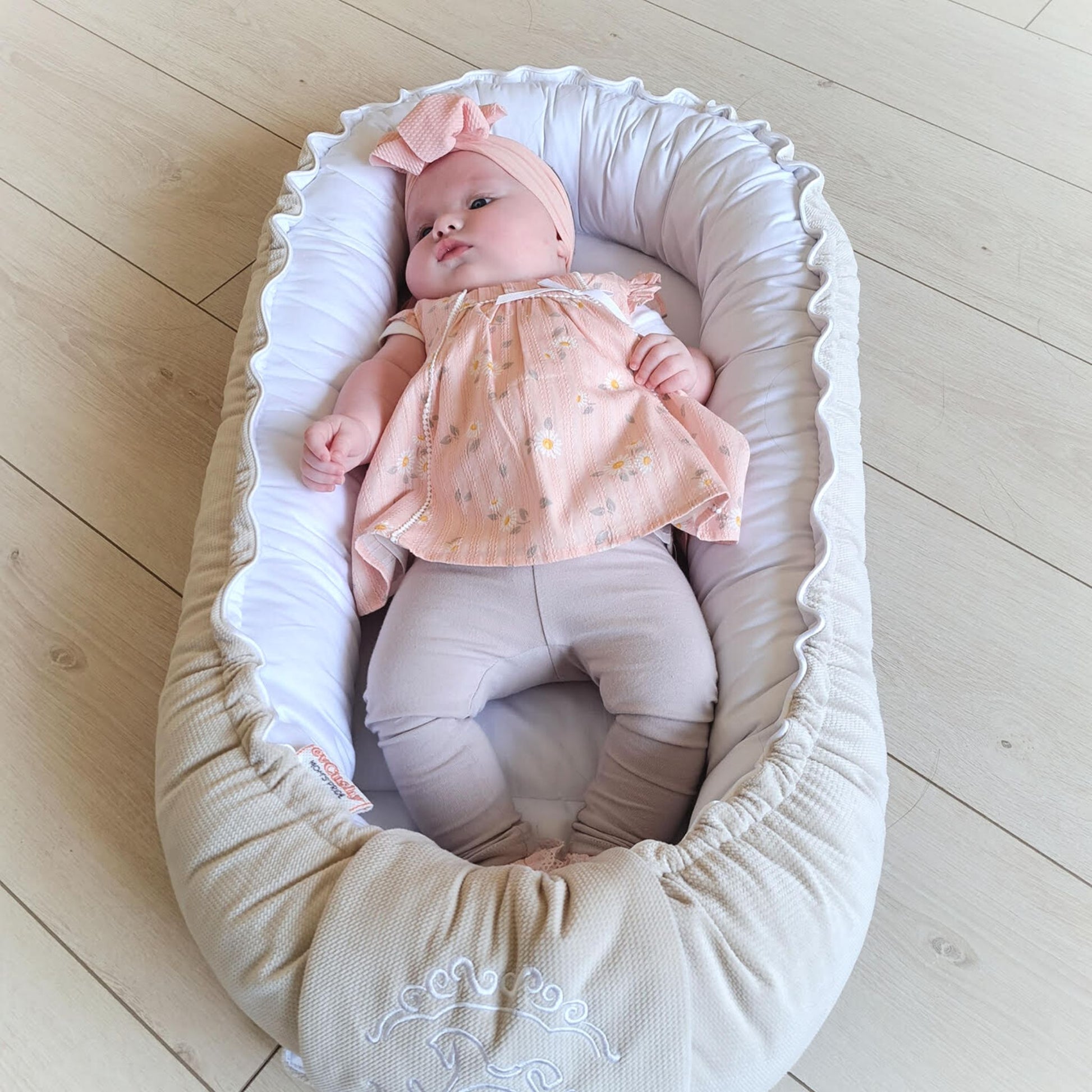 neborn sleep od lounger cosy baby nest beige and white cotton and velvet mix