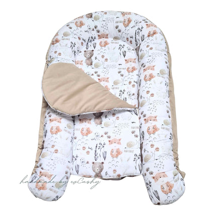 baby nest with liner from newborn safe sleeping bed for infants beige with forest pattern evcushy