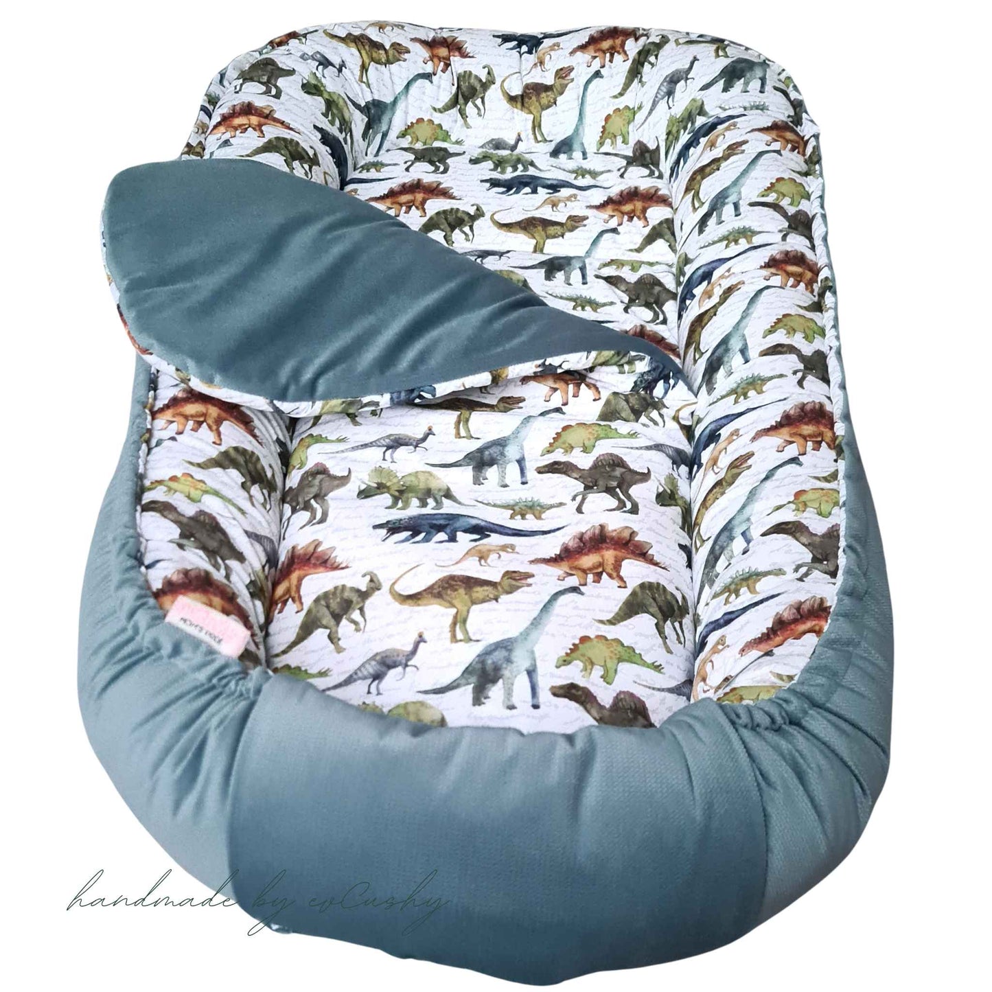 nest xxl grand sleep pod for toddler green with dinosaurs pattern
