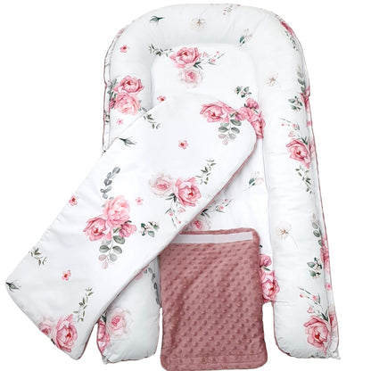 Top view of Blooming Rose XXL baby nest with pink plush bottom and rose pattern on white cotton