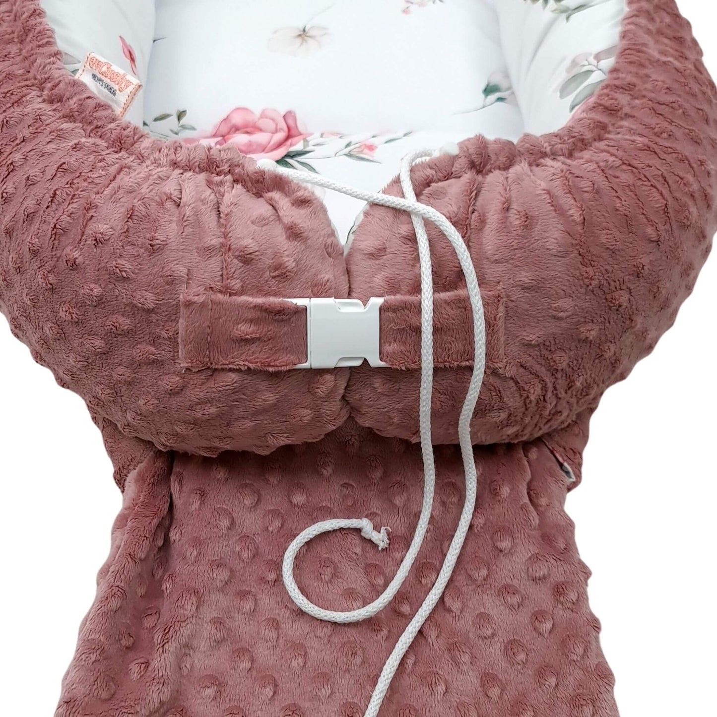 side view showing adjustable buckle and drawstrings on Blooming Rose baby nest XXL pink floral patern
