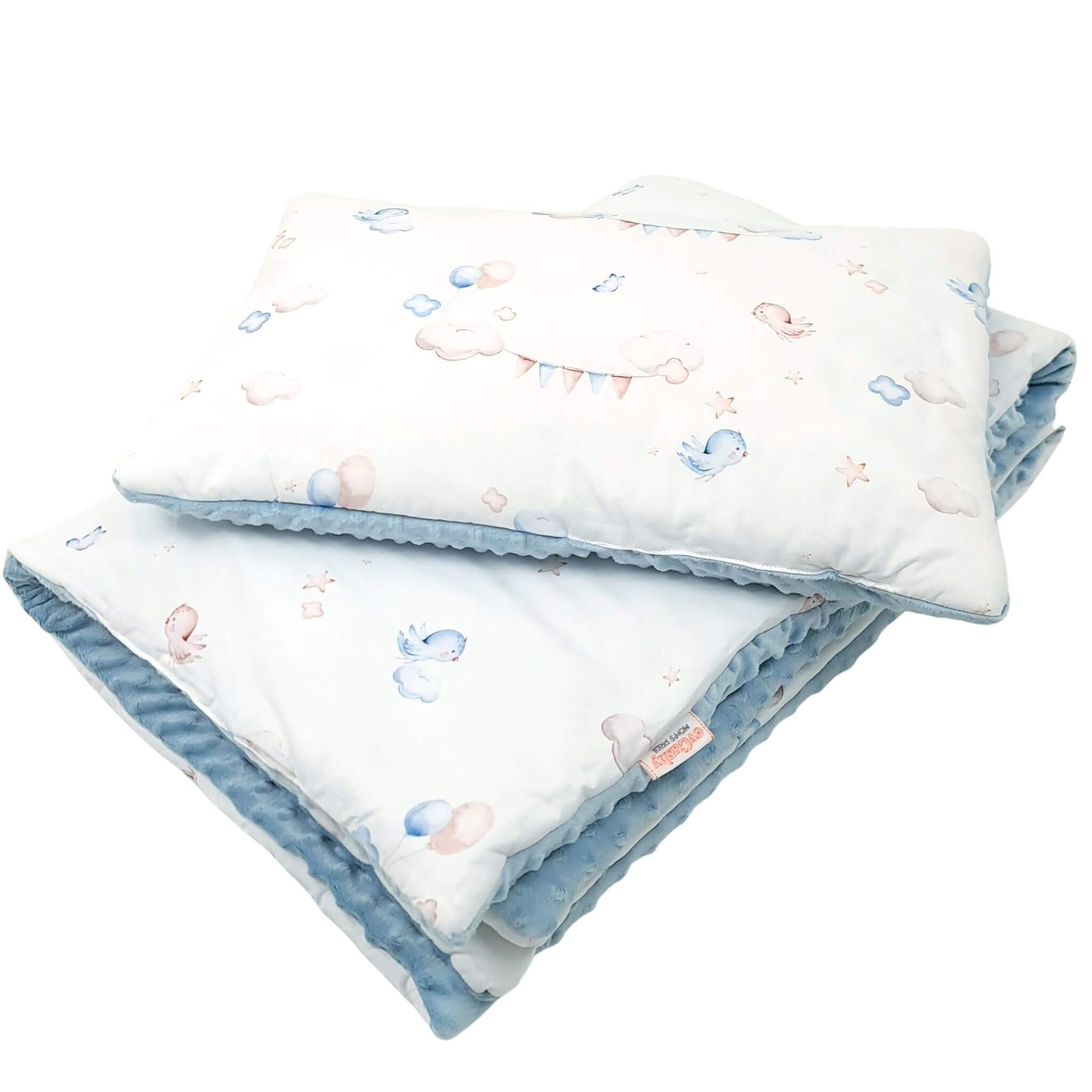 Handmade toddler bedding with birds, bunting, and clouds on white cotton and soft blue fleece.