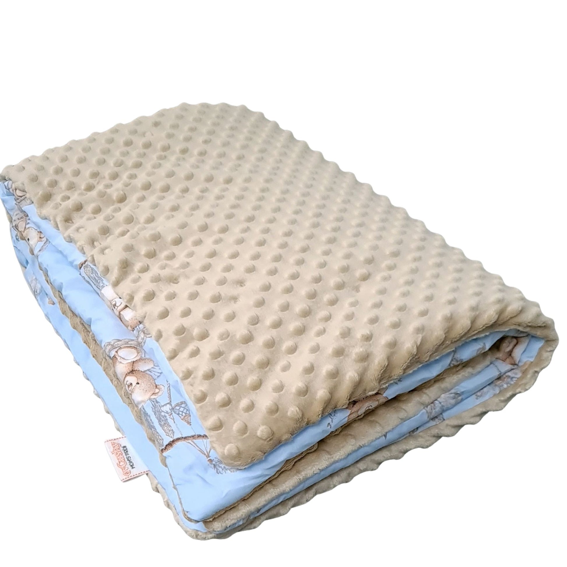 Close-up of soft plush minky reverse in mocca brown baby blanket

