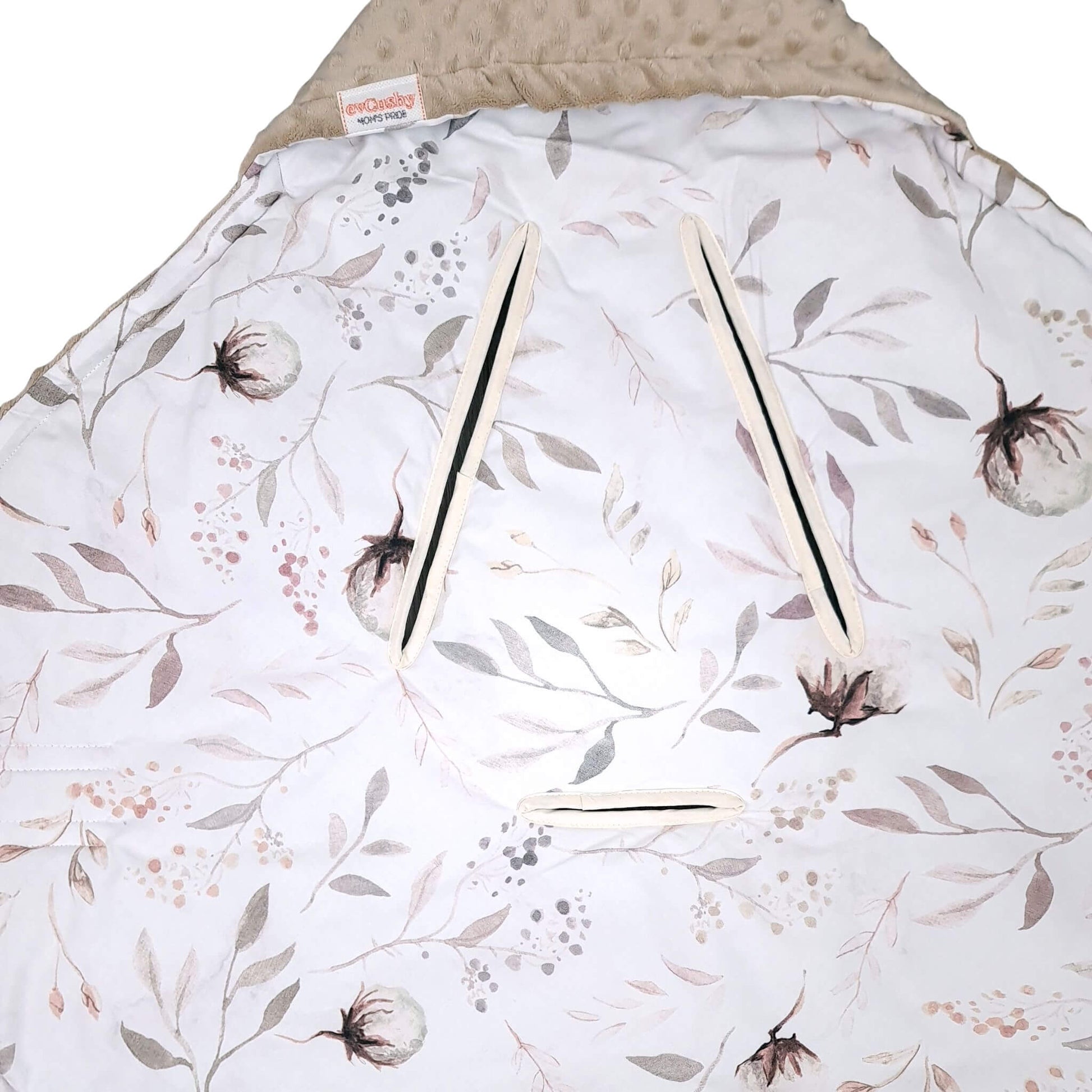 Cotton Blossom car seat blanket showing harness openings compatible with 3-point and 5-point safety systems.