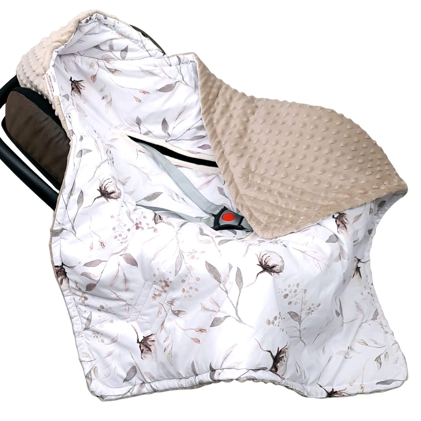Floral-patterned car seat cover with beige minky dot hood on a white background