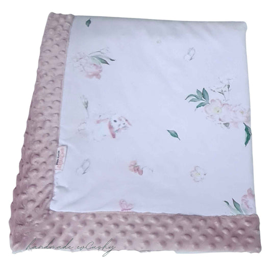 pink blanket for baby with bunnies design and soft cosy plush on the reverse size 80x100cm from evcushy