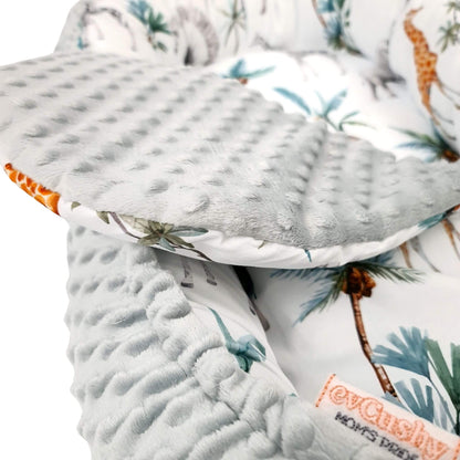 Close-up of safari print in cotton – detailed, breathable, and baby-safe