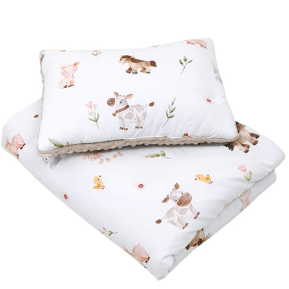 Evcushy children quilt and pillow set with farm animals — ponies, pigs, rabbits, cows, and chicks — on white cotton and mocha minky fleece.
