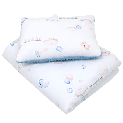 Evcushy baby quilt and pillow set with birds, clouds, and balloons on white cotton and blue plush fleece.