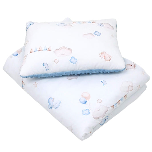 Evcushy baby quilt and pillow set with birds, clouds, and balloons on white cotton and blue plush fleece.