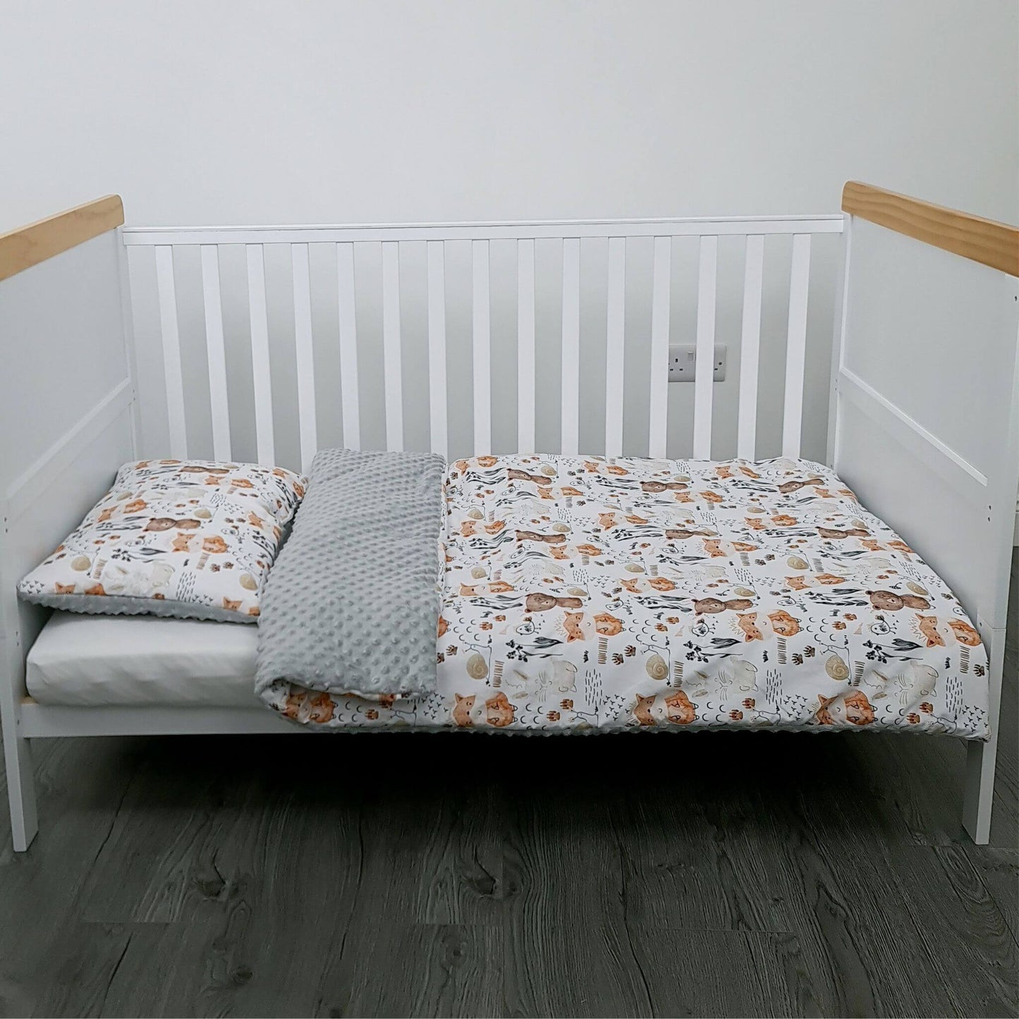Woodland Forest toddler bedding styled in nursery bed or cot