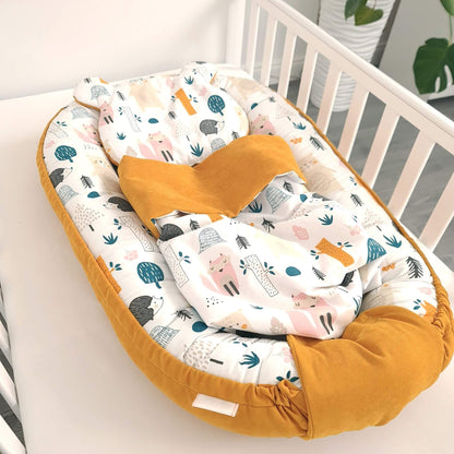 evcushy baby nest with liner pillow and blanket mustard colour and forest pattern