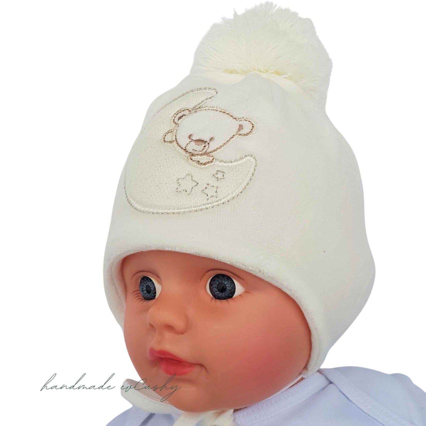 Cosy Teddy Bear on the Moon Baby Winter Hat: Secure Comfort in Cream