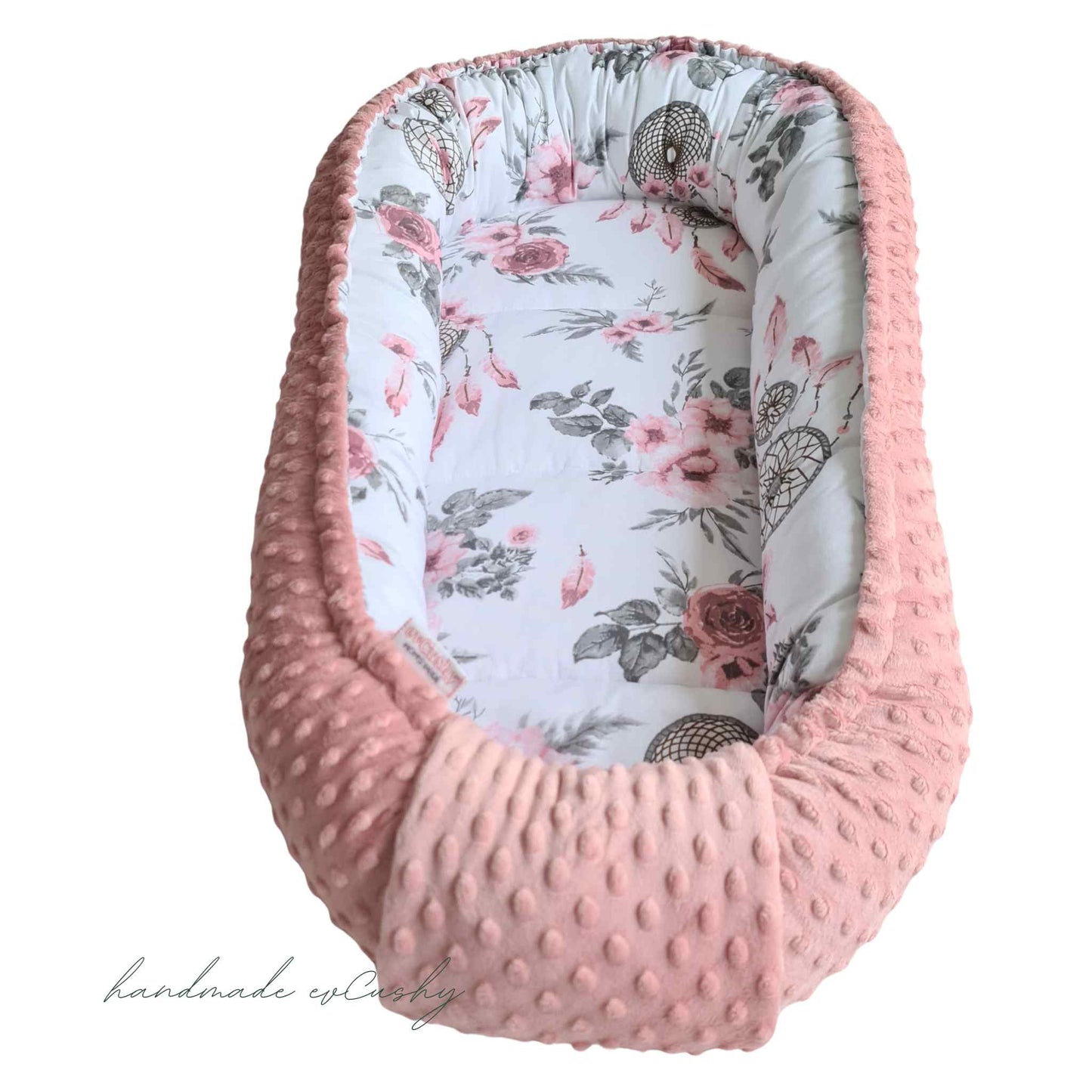 newborn baby sleep pod nest pink on one side and dreams catchers pattern on the reverse side evcushy