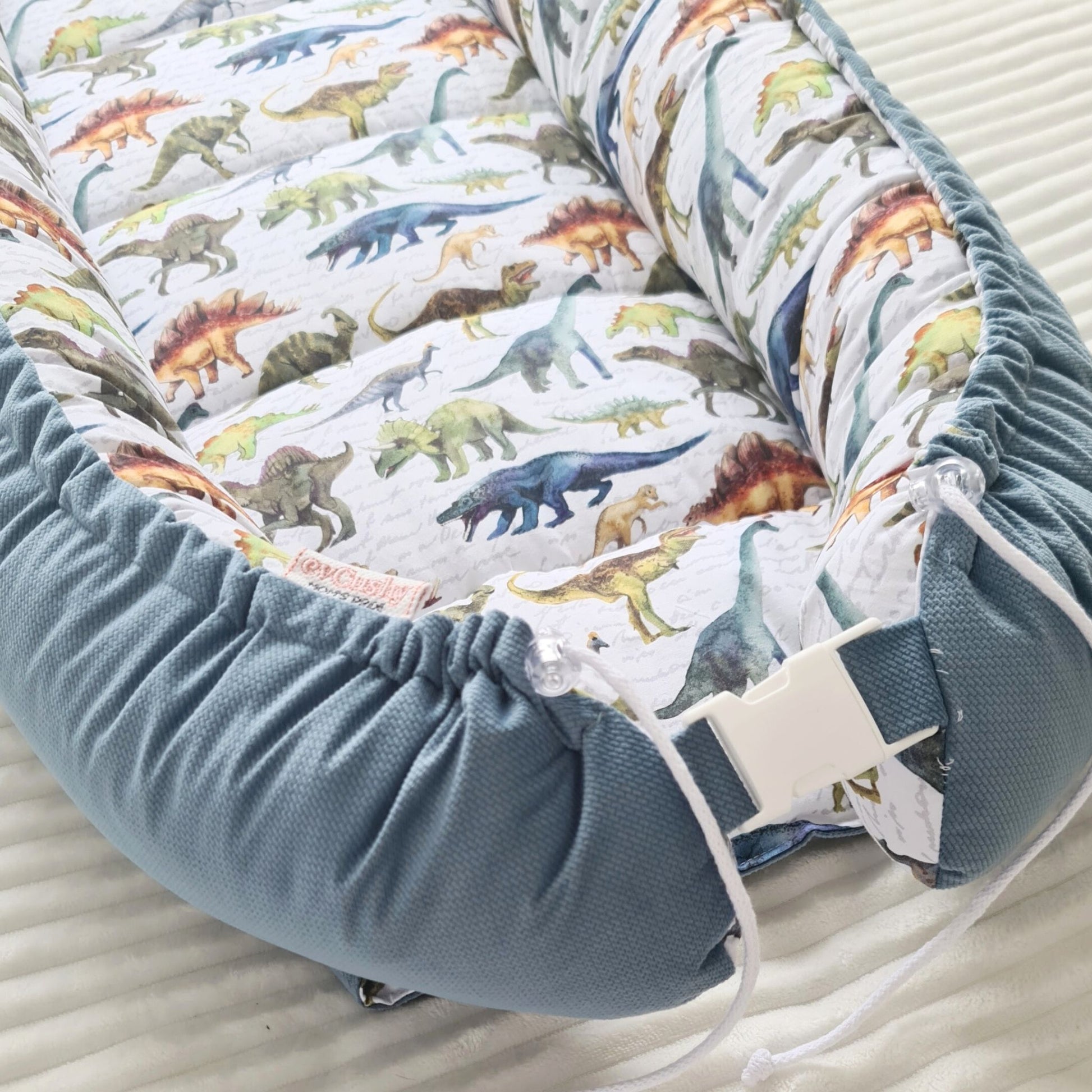 baby nest pod sleeping cushion cocoon for large baby velvet and cotton with dinos pattern