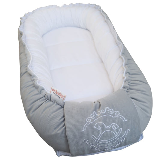 luxurious pod nest for newborn grey velvet and white cotton with embroidery rocking horse