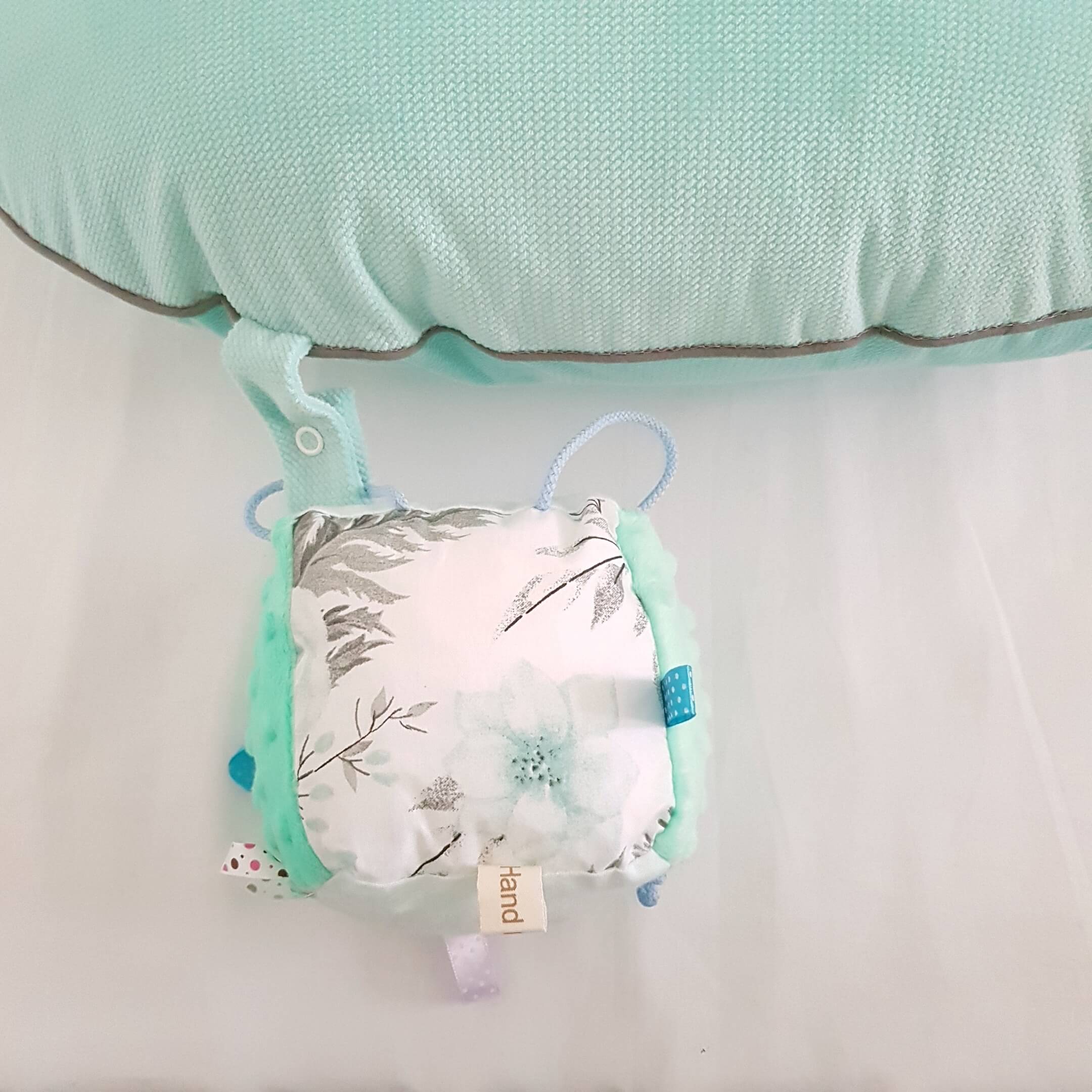 Crib support outlet pillow